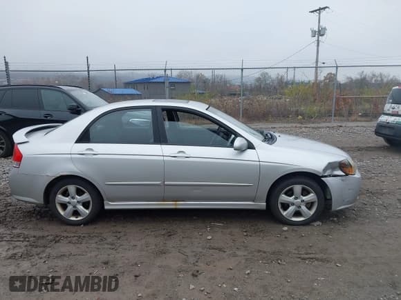 ✅ 2009 Kia Spectra EX • VIN: KNAFE222095027380 • Lot: 43730880. Listed on IAAI with 200,112 mi. Free auction sales archive from the USA and detailed vehicle history report at DreamBid. Image 13.