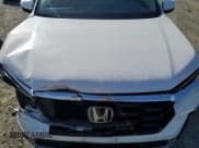 ✅ 2024 Honda Pilot Touring • VIN: 5FNYG1H75RB005716 • Лот: 82695485. Опубликован ранее на Copart с пробегом 28 226 миль. Бесплатный доступ к архиву аукционных продаж из США и подробный отчёт об истории автомобиля на DreamBid. Изображение 12.