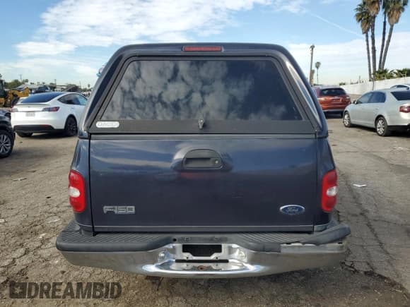 ✅ 1999 Ford F-150 XL • VIN: 1FTRF07W7XKA53261 • Lot: 46001345. Wystawiony na Copart z przebiegiem 183 965 mil. Bezpłatny archiwum sprzedaży aukcyjnych z USA i szczegółowy raport historii pojazdu na DreamBid. Zdjęcie 6.