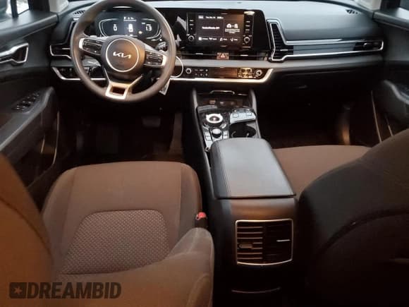 ✅ 2023 Kia Sportage LX • VIN: KNDPUCAG9P7058528 • Лот: 84559074. Опубликован ранее на Copart с пробегом 97 328 миль. Бесплатный доступ к архиву аукционных продаж из США и подробный отчёт об истории автомобиля на DreamBid. Изображение 8.