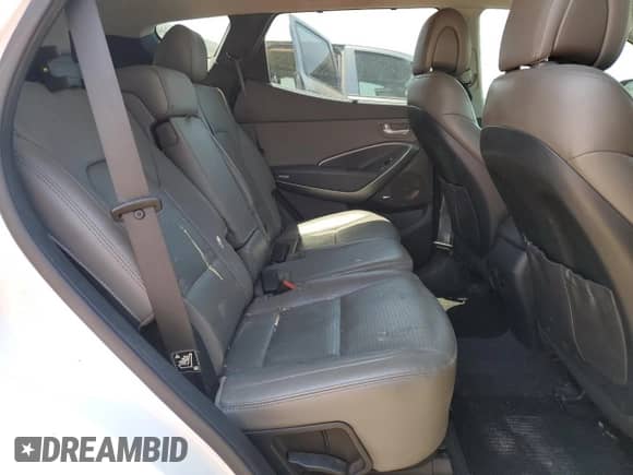 2014 Hyundai Santa Fe z VIN 5XYZW3LA2EG170485, wystawiony jako Copart lot #64200015 z przebiegiem 152 769 mil mil oraz Szkoda całkowita • Salvage title. Historia ofert i sprzedaży dostępna na DreamBid. Obrazek 11.