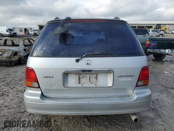 ✅ 1995 Honda Odyssey • VIN: RA21049652 • Lot: 85426404. Listed on Copart with 271,632 mi. Free auction sales archive from the USA and detailed vehicle history report at DreamBid. Image 6.