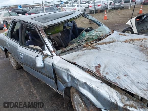 ✅ 1991 Toyota Camry • VIN: 4T1VV22E5MU065027 • Lot: 41919972. Wystawiony na IAAI z przebiegiem 157 835 mil. Bezpłatny archiwum sprzedaży aukcyjnych z USA i szczegółowy raport historii pojazdu na DreamBid. Zdjęcie 6.