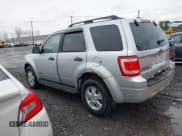 ✅ 2010 Ford Escape XLT • VIN: 1FMCU0DG8AKA46928 • Lot: 43675394. Listed on IAAI with 184,729 mi. Free auction sales archive from the USA and detailed vehicle history report at DreamBid. Image 3.
