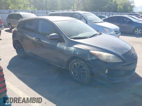 ✅ 2012 Mazda 3 i Touring • VIN: JM1BL1L78C1675611 • Lot: 42398294. Listed on IAAI with 164,809 mi. Free auction sales archive from the USA and detailed vehicle history report at DreamBid. Image 1.