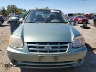 2004 Hyundai Accent GL с VIN KMHCG45C24U503929, выставлен на аукционе Copart как лот 71820915 с пробегом 146 643 миль миль и Списание • Salvage title. История ставок и продаж доступна на DreamBid. Изображение 5.