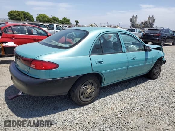 ✅ 1999 Ford Escort LX • VIN: 1FAFP10P6XW196483 • Lot: 59215635. Listed on Copart with 74,859 mi. Free auction sales archive from the USA and detailed vehicle history report at DreamBid. Image 3.