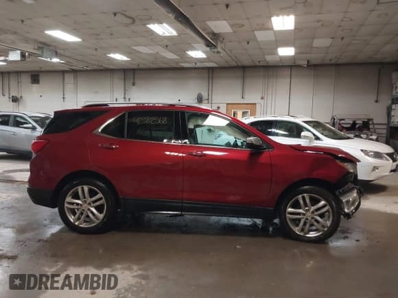 ✅ 2019 Chevrolet Equinox Premier • VIN: 2GNAXYEX8K6271491 • Лот: 42382568. Опубликован ранее на IAAI с пробегом 100 954 миль. Бесплатный доступ к архиву аукционных продаж из США и подробный отчёт об истории автомобиля на DreamBid. Изображение 13.