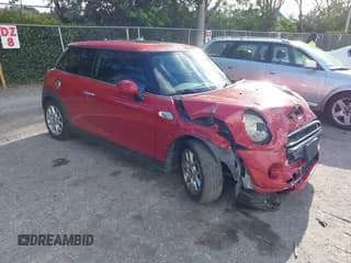 ✅ 2014 MINI Hardtop S • VIN: WMWXM7C51ET988024 • Lot: 42767313. Listed on IAAI with 70,672 mi. Free auction sales archive from the USA and detailed vehicle history report at DreamBid. Image 1.