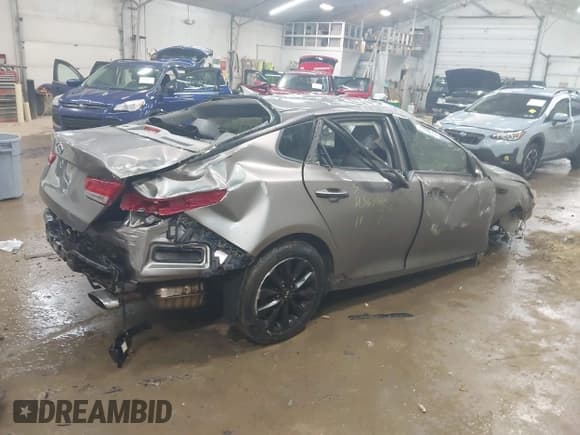 ✅ 2018 Kia Optima EX • VIN: 5XXGU4L30JG273357 • Lot: 43644036. Listed on IAAI with 125,746 mi. Free auction sales archive from the USA and detailed vehicle history report at DreamBid. Image 4.