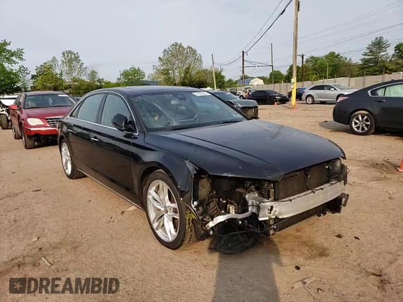 ✅ 2015 Audi A8 4.0T • VIN: WAU32AFD8FN031206 • Лот: 51890263. Опубликован ранее на Copart с пробегом 34 527 миль. Бесплатный доступ к архиву аукционных продаж из США и подробный отчёт об истории автомобиля на DreamBid. Изображение 11.