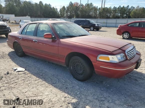 ✅ 2001 Ford Crown Victoria • VIN: 2FAFP73W51X102000 • Lot: 83523364. Listed on Copart with 202,320 mi. Free auction sales archive from the USA and detailed vehicle history report at DreamBid. Image 4.