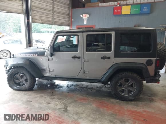 ✅ 2017 Jeep Wrangler Unlimited Rubicon Recon • VIN: 1C4BJWFG5HL687757 • Lot: 42367095. Listed on IAAI with 48,441 mi. Free auction sales archive from the USA and detailed vehicle history report at DreamBid. Image 14.