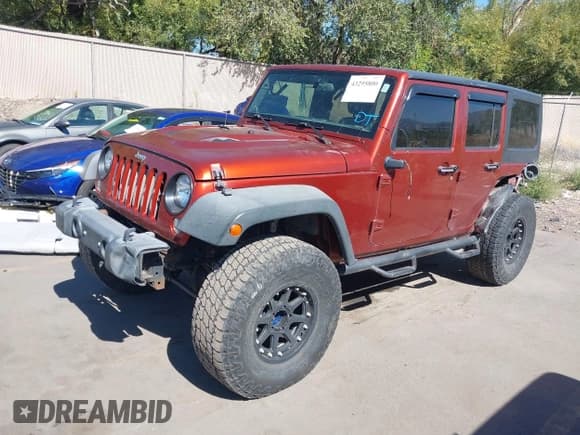 ✅ 2014 Jeep Wrangler Unlimited Rubicon • VIN: 1C4HJWFG3EL210802 • Lot: 43295800. Listed on IAAI with 117,719 mi. Free auction sales archive from the USA and detailed vehicle history report at DreamBid. Image 2.
