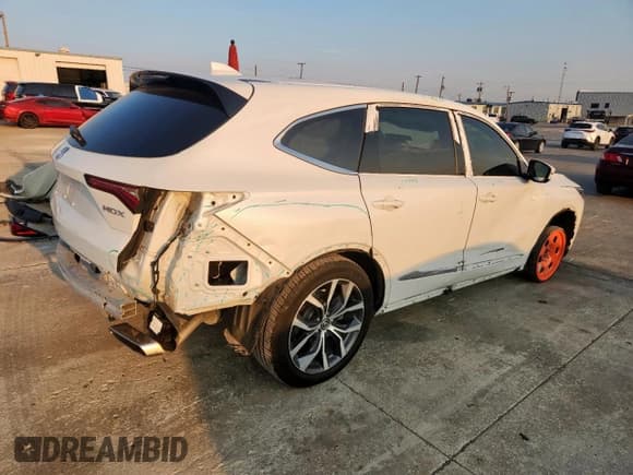 ✅ 2022 Acura MDX Technology • VIN: 5J8YD9H47NL010812 • Lot: 80693775. Listed on Copart with 64,264 mi. Free auction sales archive from the USA and detailed vehicle history report at DreamBid. Image 3.