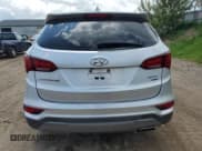 ✅ 2017 Hyundai Santa Fe 2.4L • VIN: 5XYZTDLB9HG466552 • Lot: 57265315. Listed on Copart with 123,390 mi. Free auction sales archive from the USA and detailed vehicle history report at DreamBid. Image 6.