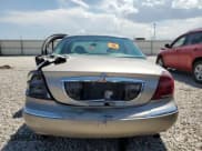 ✅ 2001 Lincoln Continental • VIN: 1LNHM97V21Y698784 • Лот: 64040134. Опубликован ранее на Copart с пробегом Не указан. Бесплатный доступ к архиву аукционных продаж из США и подробный отчёт об истории автомобиля на DreamBid. Изображение 6.