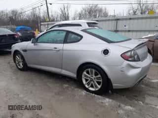 2008 Hyundai Tiburon GS с VIN KMHHM66D98U266704, выставлен на аукционе Copart как лот 44511515 с пробегом 115 671 миль миль и На запчасти • Non repairable. История ставок и продаж доступна на DreamBid. Изображение 2.