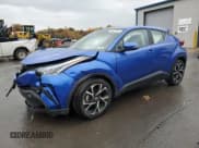 ✅ 2021 Toyota C-HR XLE • VIN: NMTKHMBX7MR122228 • Лот: 86479765. Опубликован ранее на Copart с пробегом 6 724 миль. Бесплатный доступ к архиву аукционных продаж из США и подробный отчёт об истории автомобиля на DreamBid. Изображение 1.
