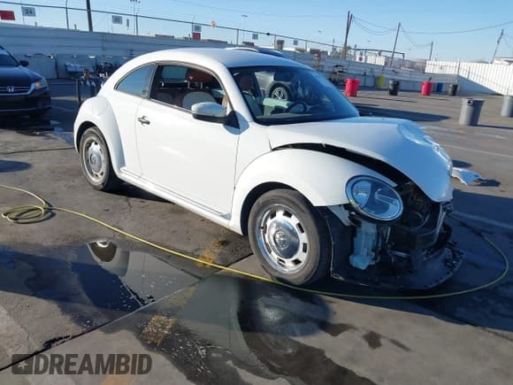 ✅ 2015 Volkswagen Beetle Fleet Edition • VIN: 3VWF17AT2FM604838 • Lot: 40814174. Listed on IAAI with Not provided. Free auction sales archive from the USA and detailed vehicle history report at DreamBid. Image 1.
