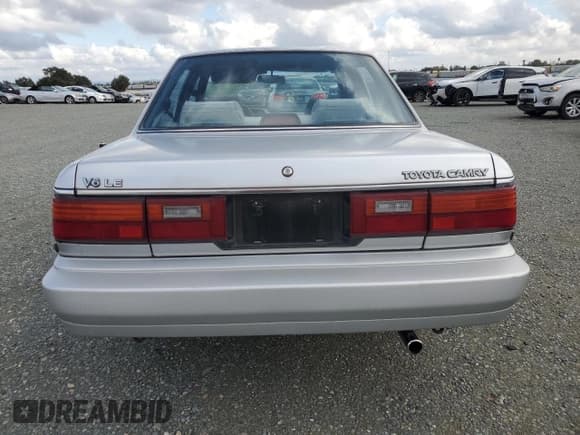 ✅ 1989 Toyota Camry • VIN: JT2VV22E3K0049538 • Lot: 78870034. Wystawiony na Copart z przebiegiem 100 396 mil. Bezpłatny archiwum sprzedaży aukcyjnych z USA i szczegółowy raport historii pojazdu na DreamBid. Zdjęcie 6.