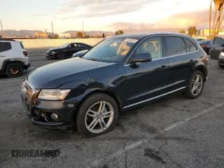 ✅ 2014 Audi Q5 Premium Plus • VIN: WA1LFAFP0EA100990 • Lot: 93380535. Listed on Copart with 117,472 mi. Free auction sales archive from the USA and detailed vehicle history report at DreamBid. Image 1.