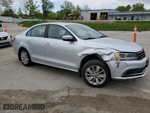 ✅ 2015 Volkswagen Jetta SE • VIN: 3VWD17AJ1FM311745 • Lot: 55936435. Listed on Copart with 79,819 mi. Free auction sales archive from the USA and detailed vehicle history report at DreamBid. Image 4.