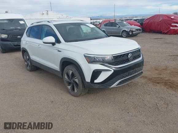 ✅ 2024 Volkswagen Taos SE • VIN: 3VVVX7B2XRM131120 • Lot: 43806291. Listed on IAAI with 30,232 mi. Free auction sales archive from the USA and detailed vehicle history report at DreamBid. Image 1.
