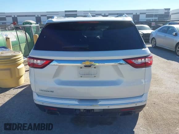 2018 Chevrolet Traverse Premier с VIN 1GNERKKW6JJ229116, выставлен на аукционе IAAI как лот 43603840 с пробегом 157 240 миль миль и . История ставок и продаж доступна на DreamBid. Изображение 16.