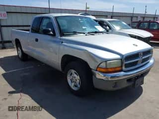 2002 Dodge Dakota SLT с VIN 1B7GL42X72S582306, выставлен на аукционе IAAI как лот 41823338 с пробегом 163 455 миль миль и . История ставок и продаж доступна на DreamBid. Изображение 1.