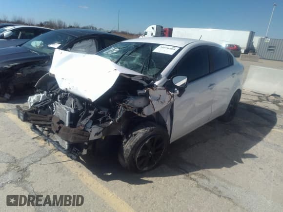 ✅ 2017 Kia Rio LX • VIN: KNADM4A33H6063122 • Lot: 40390246. Wystawiony na IAAI z przebiegiem Nie podano. Bezpłatny archiwum sprzedaży aukcyjnych z USA i szczegółowy raport historii pojazdu na DreamBid. Zdjęcie 2.