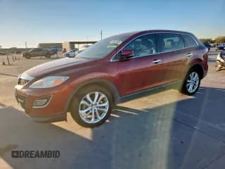 ✅ 2012 Mazda CX-9 Grand Touring • VIN: JM3TB2DA8C0340286 • Lot: 91631585. Wystawiony na Copart z przebiegiem 180 782 mil. Bezpłatny archiwum sprzedaży aukcyjnych z USA i szczegółowy raport historii pojazdu na DreamBid. Zdjęcie 1.