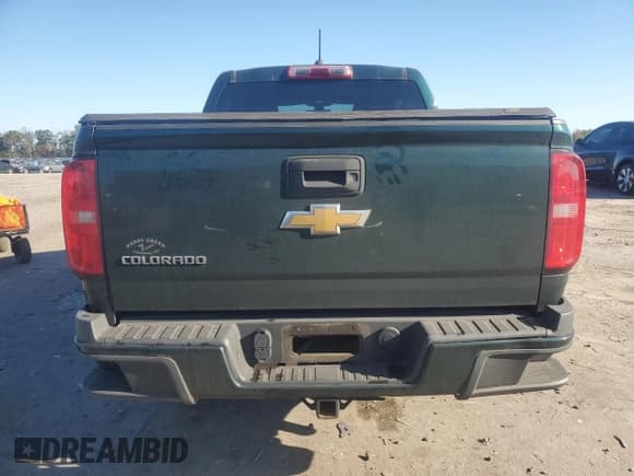 ✅ 2015 Chevrolet Colorado 4WD Z71 • VIN: 1GCGTCE31F1130897 • Лот: 82410375. Опубликован ранее на Copart с пробегом 207 479 миль. Бесплатный доступ к архиву аукционных продаж из США и подробный отчёт об истории автомобиля на DreamBid. Изображение 6.