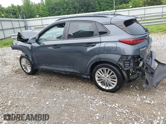 ✅ 2021 Hyundai Kona SEL • VIN: KM8K22AA7MU706642 • Лот: 64498245. Опубликован ранее на Copart с пробегом 99 999 миль. Бесплатный доступ к архиву аукционных продаж из США и подробный отчёт об истории автомобиля на DreamBid. Изображение 2.