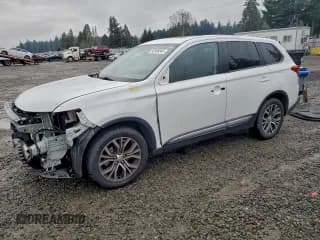 ✅ 2018 Mitsubishi Outlander ES • VIN: JA4AZ3A32JZ063967 • Lot: 93986045. Listed on Copart with 57,333 mi. Free auction sales archive from the USA and detailed vehicle history report at DreamBid. Image 1.