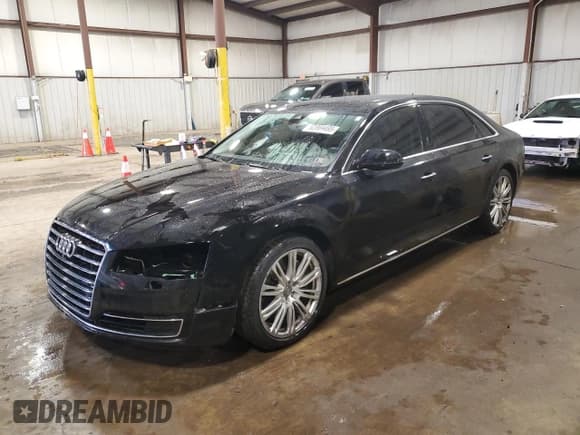 ✅ 2015 Audi A8 3.0L TDI • VIN: WAU3MAFD3FN002044 • Lot: 52869495. Listed on Copart with 129,094 mi. Free auction sales archive from the USA and detailed vehicle history report at DreamBid. Image 1.