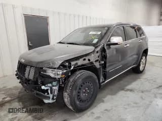 ✅ 2014 Jeep Grand Cherokee Summit • VIN: 1C4RJFJT8EC268672 • Lot: 69583715. Listed on Copart with 157,725 mi. Free auction sales archive from the USA and detailed vehicle history report at DreamBid. Image 1.