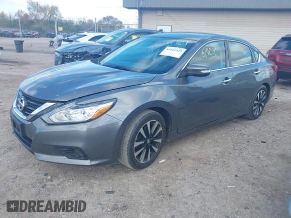 ✅ 2018 Nissan Altima S • VIN: 1N4AL3AP7JC156180 • Lot: 43561429. Listed on IAAI with 105,748 mi. Free auction sales archive from the USA and detailed vehicle history report at DreamBid. Image 17.