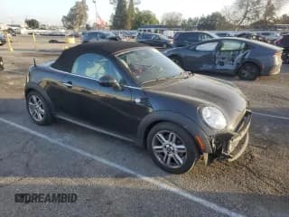 ✅ 2012 MINI Roadster • VIN: WMWSY1C58CT311609 • Lot: 87642395. Listed on Copart with 56,169 mi. Free auction sales archive from the USA and detailed vehicle history report at DreamBid. Image 4.