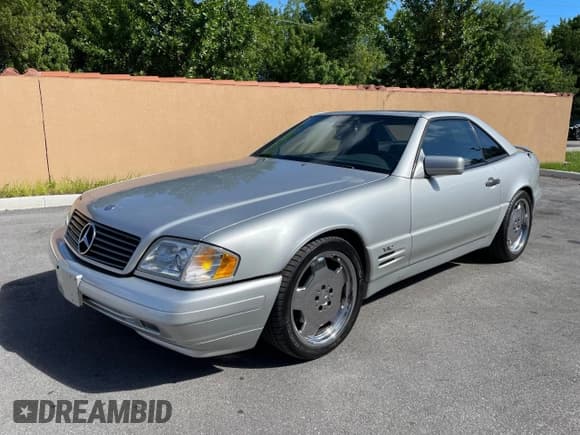 ✅ 1997 Mercedes-Benz SL • VIN: WDBFA76F9VF144872 • Lot: 89713215. Listed on Copart with 90,999 mi. Free auction sales archive from the USA and detailed vehicle history report at DreamBid. Image 2.