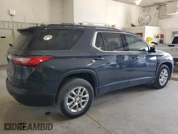 ✅ 2021 Chevrolet Traverse LT Cloth • VIN: 1GNERGKW5MJ233918 • Lot: 84219555. Listed on Copart with 82,663 mi. Free auction sales archive from the USA and detailed vehicle history report at DreamBid. Image 3.