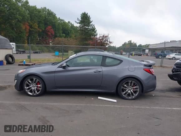 2015 Hyundai Genesis Coupe Ultimate with VIN KMHHU6KJ4FU129999, listed as a IAAI auction lot 43353324 with 71,869 mi miles and . Bid and sale history available at DreamBid. Image 14.