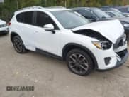 ✅ 2016 Mazda CX-5 Grand Touring • VIN: JM3KE4DY6G0873688 • Lot: 43565324. Wystawiony na IAAI z przebiegiem 80 920 mil. Bezpłatny archiwum sprzedaży aukcyjnych z USA i szczegółowy raport historii pojazdu na DreamBid. Zdjęcie 1.