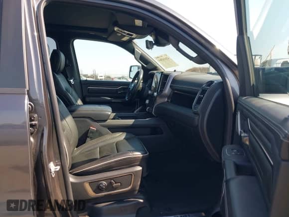 2021 Ram 1500 Limited z VIN 1C6SRFPT2MN830643, wystawiony jako IAAI lot #42416364 z przebiegiem 53 548 mil mil oraz . Historia ofert i sprzedaży dostępna na DreamBid. Obrazek 5.