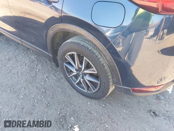 ✅ 2018 Mazda CX-5 Grand Touring • VIN: JM3KFBDM6J0473734 • Лот: 43536049. Опубликован ранее на IAAI с пробегом 124 488 миль. Бесплатный доступ к архиву аукционных продаж из США и подробный отчёт об истории автомобиля на DreamBid. Изображение 6.