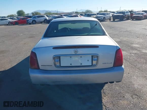 ✅ 2002 Cadillac DeVille • VIN: 1G6KD54Y62U107997 • Lot: 43608839. Listed on IAAI with 107,528 mi. Free auction sales archive from the USA and detailed vehicle history report at DreamBid. Image 16.