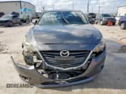 ✅ 2014 Mazda 3 i Sport • VIN: JM1BM1K76E1204249 • Лот: 64626485. Опубликован ранее на Copart с пробегом 129 967 миль. Бесплатный доступ к архиву аукционных продаж из США и подробный отчёт об истории автомобиля на DreamBid. Изображение 5.