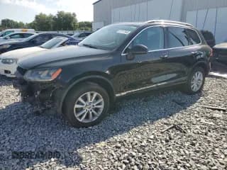 ✅ 2013 Volkswagen Touareg Exec • VIN: WVGEF9BP6DD008164 • Lot: 57117945. Listed on Copart with 8,310 mi. Free auction sales archive from the USA and detailed vehicle history report at DreamBid. Image 1.