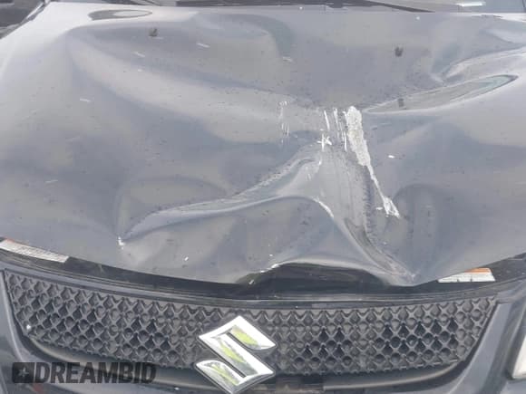 ✅ 2012 Suzuki SX4 Crossover • VIN: JS2YB5A36C6303021 • Lot: 41446779. Wystawiony na IAAI z przebiegiem 94 469 mil. Bezpłatny archiwum sprzedaży aukcyjnych z USA i szczegółowy raport historii pojazdu na DreamBid. Zdjęcie 10.