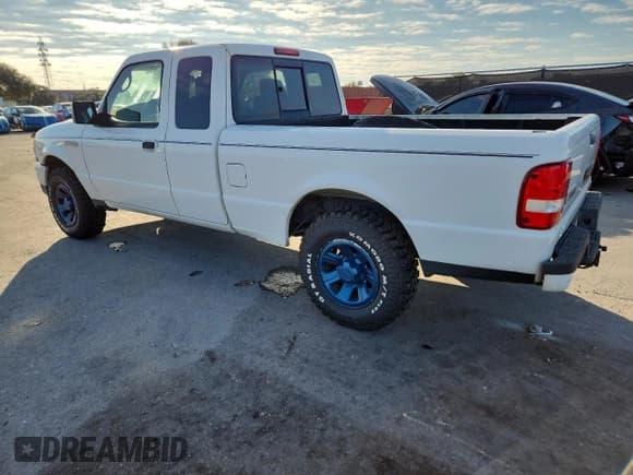✅ 2006 Ford Ranger STX • VIN: 1FTZR44E36PA37604 • Lot: 90730775. Listed on Copart with 154,379 mi. Free auction sales archive from the USA and detailed vehicle history report at DreamBid. Image 2.